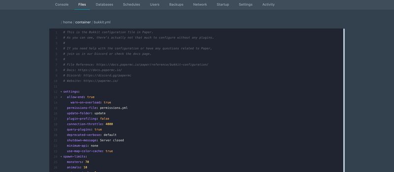 bukkit.yml open in the panel file editor at the line the parser named: line 14 is indented with a tab instead of spaces, so it sits out of line with the keys above and below it and the editor has left its key unhighlighted